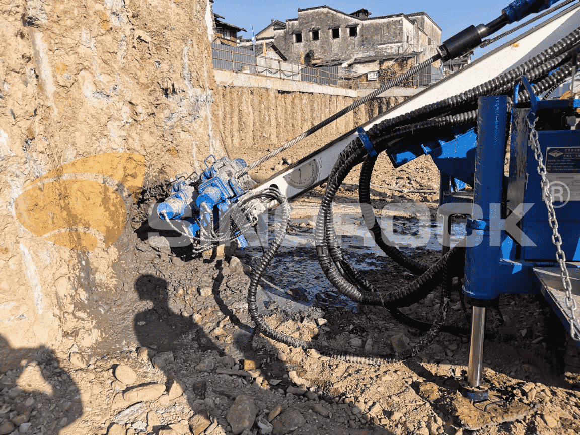 Simultaneous drilling and grouting